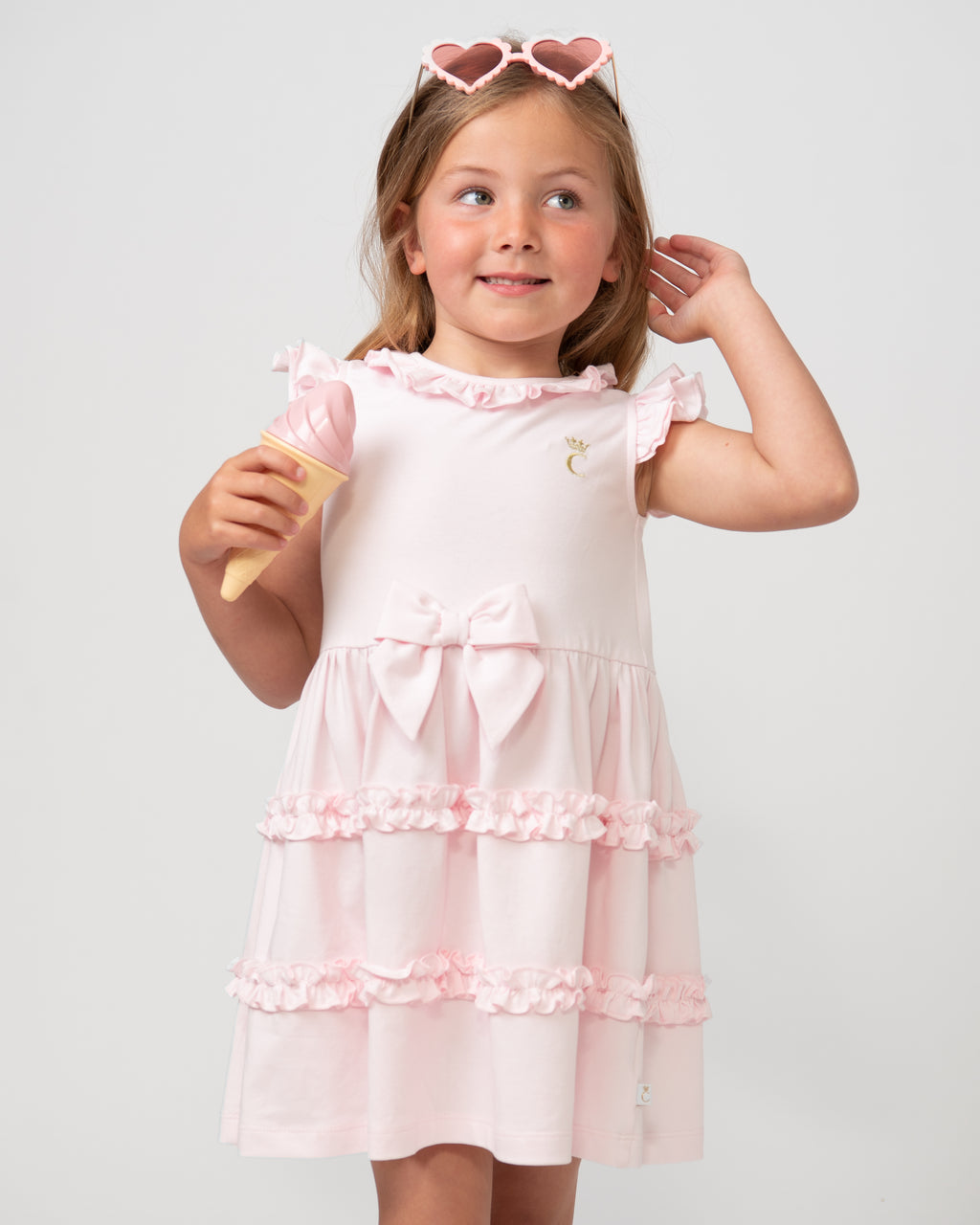 SS24 Caramelo Pale Pink Tiered Bow Frill Dress